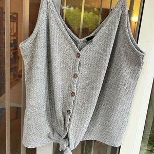 Gray waffle print tank top with knotted tie at the bottom, size small.